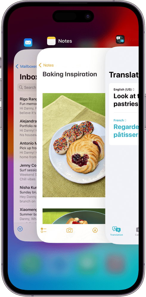An iPhone displaying open apps on-screen, such as Mail, Notes and Google Translate.